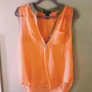 light orange polyester top
